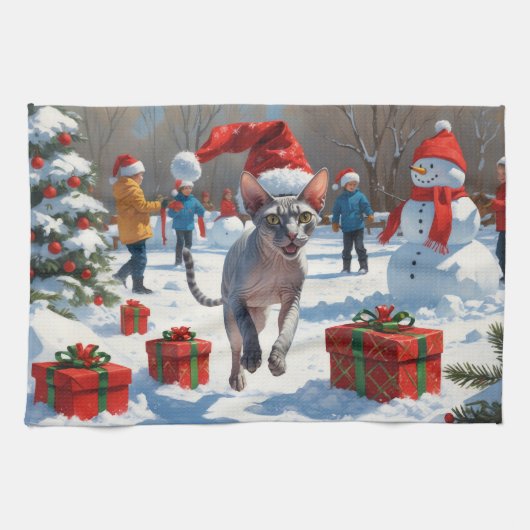 Sphynx kat loopt in de sneeuw met kerstmuts theedoek (Horizontaal)