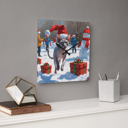 Sphynx kat loopt in de sneeuw met kerstmuts vierkante klok (Kantoor)