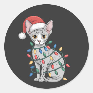 Sphynx kat met een kerstmuts en ingepakt in Kerstm Ronde Sticker
