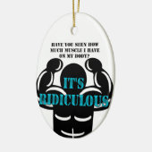 spieren zo sterk als belachelijk grappig keramisch ornament (Links)