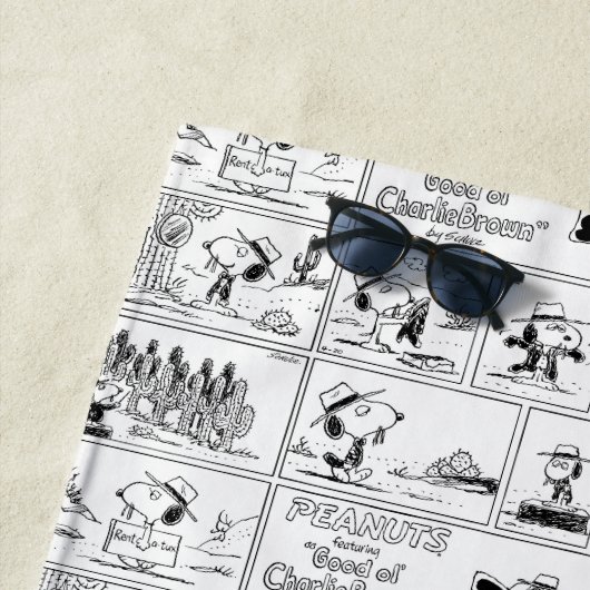 Spike is dirigent van het orkest strandlaken (In situ)