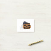 Spin in het web in de halloween pompoen post-it® notes (Op bureau)