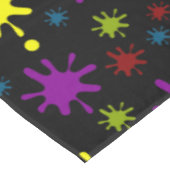 Spletters schilderen op een zwarte achtergrond tafelkleed (Gekanteld)