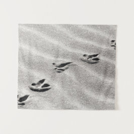 Sporen in de zand wandkleed