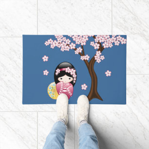Spring Kokeshi Doll - Japanse geisha wordt in blau Deurmat