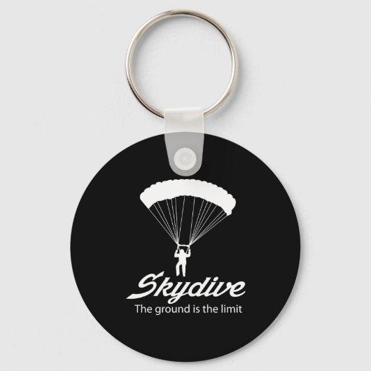 Spring met parachute de grond is de limiet sleutelhanger (Voorkant)
