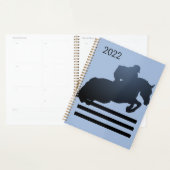 Springruiter die een hindernis neemt.  planner (Display)
