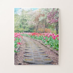 Springtime Flowers Along Stone Walkway Legpuzzel