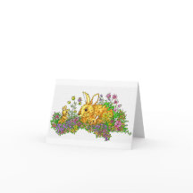 Springtime konijntjes in een bloemenveld