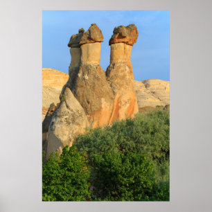 Sprookjesachtige schoorstenen bij zonsondergang poster