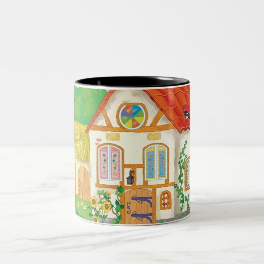 sprookjeshuis met rood dak en cartoon tweekleurige koffiemok (Center)