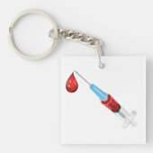 Spuit met een rode druppel sleutelhanger (Voorkant)