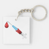 Spuit met een rode druppel sleutelhanger (Achterkant)