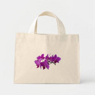 Spuit van paarse orchideeën op een tas