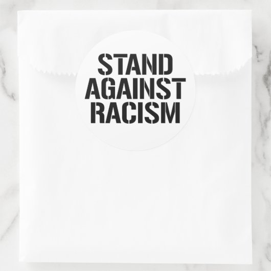 Sta tegen racisme ronde sticker (Tas)