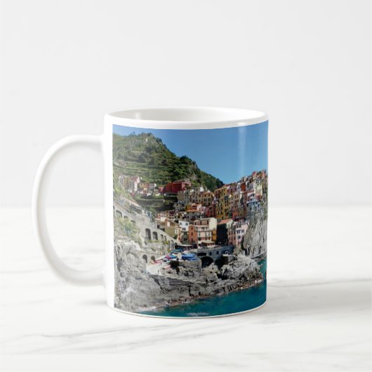 stad op klif koffiemok (Links)