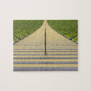 Stadiumtrap tussen rijen groene stoelen legpuzzel