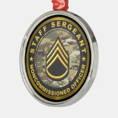 Stafbrigadier, officier werkster metalen ornament (Links)