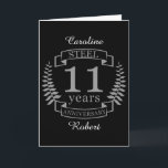 Stalen elfde huwelijksverjaardag 11 jaar kaart<br><div class="desc">Een ontwerp om 11 jaar huwelijk te vieren. Dit ontwerp heeft een grijs (staal) gekleurd laurierontwerp op een zwarte achtergrond. Staal is het traditionele geschenk voor deze gelegenheid. De tekst luidt Stalen 11 jaar jubileum. Een romantisch ontwerp om je 11e huwelijksverjaardag te vieren. Als je hulp nodig hebt bij het...</div>