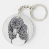 Standaard zwart-witschilderwerk met wieltjes sleutelhanger (Achterkant)