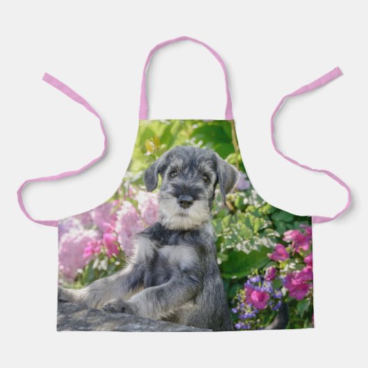 Standard Schnauzer Puppy in een bloeiende tuin - Schort (Voorkant)