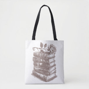 Stapel boeken bekroond met een roos tote bag