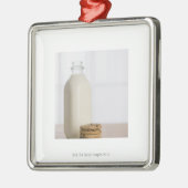 Stapel chocoladekoekjes melk in een glas metalen ornament (Links)