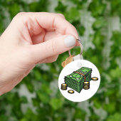 Stapel geld met munten geld sleutelhanger