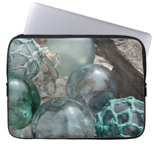 Stapel glazen visdobbers laptop sleeve