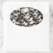 stapel schedels ovale sticker (Tas)