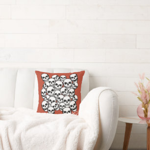 Stapel schedels verbrand Amber rode achtergrond na Kussen