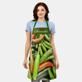 Stapel van groene pittige paprika's schort