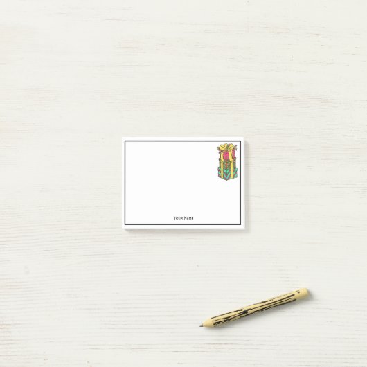 Stapelde gevlekte kerstcadeautjes post-it® notes (Op bureau)