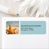 Starfish en Seashells op de strand Etiket (Insitu)