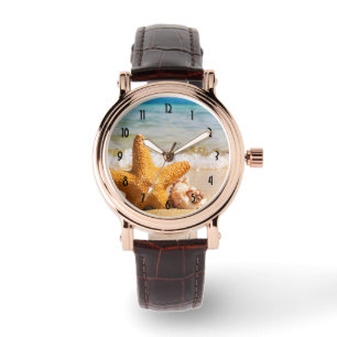 Starfish en Seashells op de strand Horloge