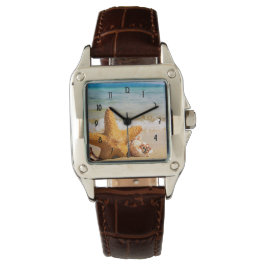 Starfish en Seashells op de strand Horloge