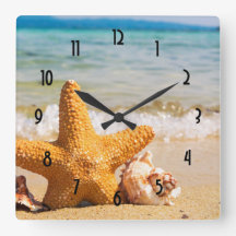 Starfish en Seashells op de strand