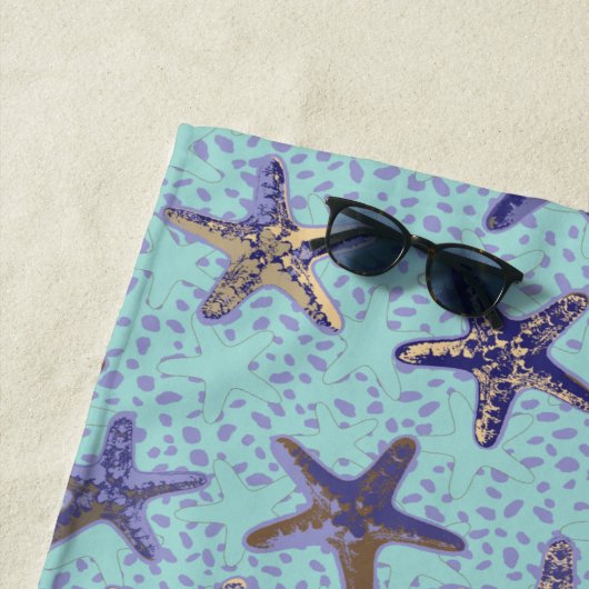 Starfish in de zand strandlaken (In situ)