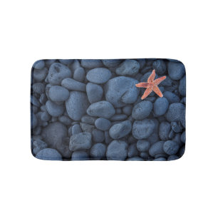 Starfish on Black Rocks langs de kust IJsland Badmat