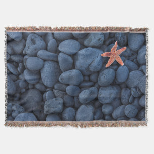Starfish on Black Rocks langs de kust IJsland Deken