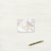 Starfish op een handdoek post-it® notes (Op bureau)