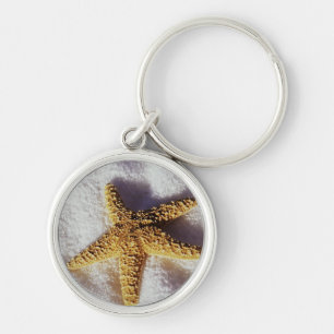 Starfish op een handdoek sleutelhanger