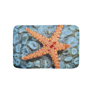 Starfish op een koraal met pokken badmat