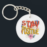 Stay Positive – Floral Motivational Sleutelhanger<br><div class="desc">Brighten your day with this uplifting design! The bold phrase STAY POSITIVE is highlighted with vibrant colors and surrounded by cheerful floral elements, making it a perfect reminder to embrace optimism and good vibes. Ideal for casual wear, workouts, or as a thoughtful gift to inspire positivity.</div>
