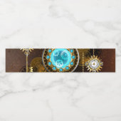 Steampunk roestige achtergrond met turkooizen lenz waterfles etiket (Enkel label)