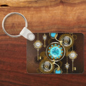Steampunk roestige achtergrond met turquoise lenze sleutelhanger (Achterkant)