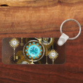 Steampunk roestige achtergrond met turquoise lenze sleutelhanger (Voorkant)