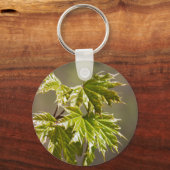Steekgroene teeltak met kleine bladeren sleutelhan sleutelhanger (Achterkant)