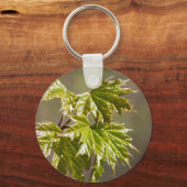 Steekgroene teeltak met kleine bladeren sleutelhan sleutelhanger (Voorkant)