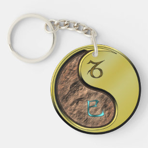 Steenbok & metalen slang sleutelhanger